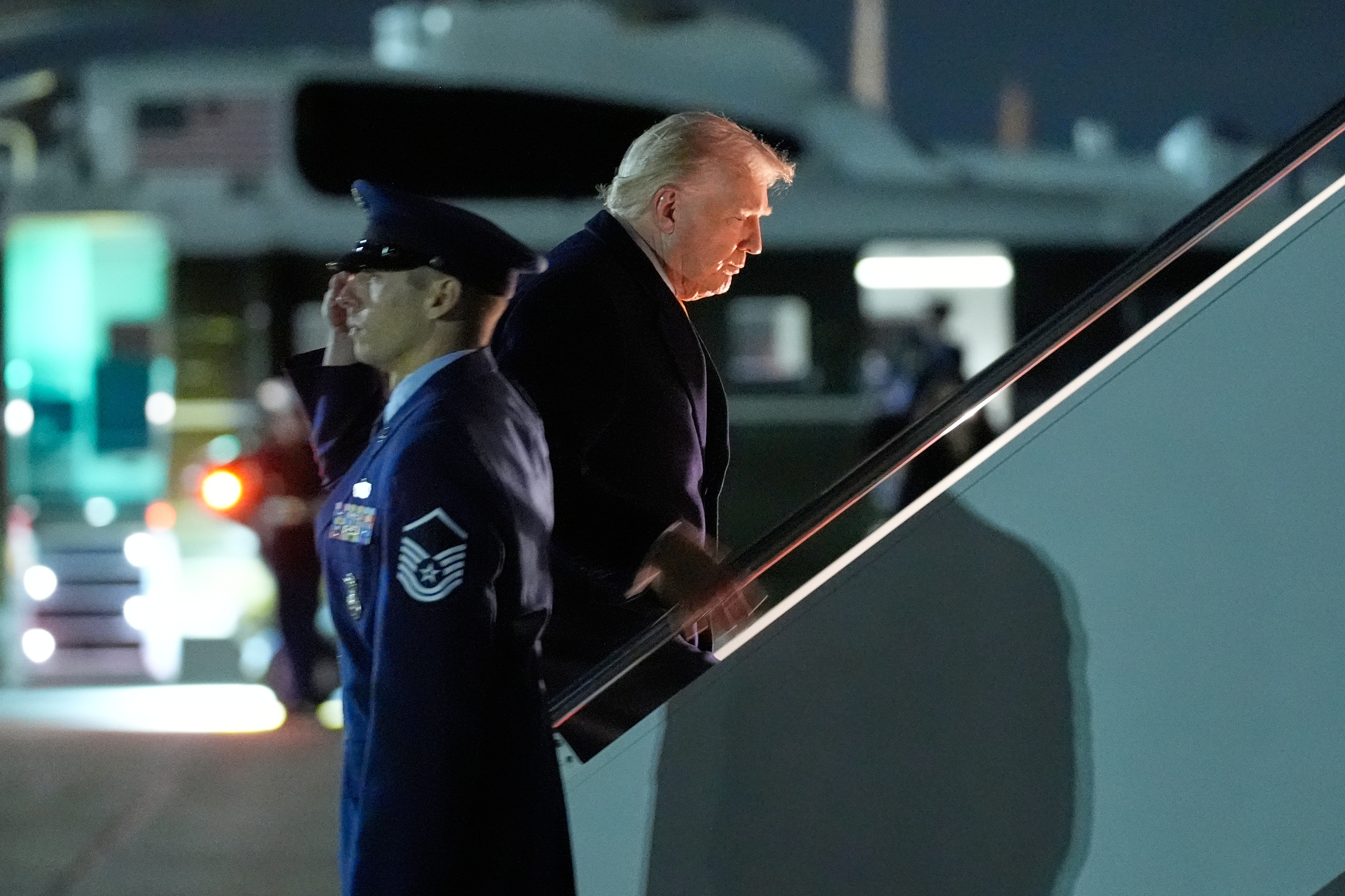 President Trump boards Air Force One at Joint Base Andrews, Md., on his way to his Mar-a-Lago estate in Palm Beach, Fla., on Friday.
